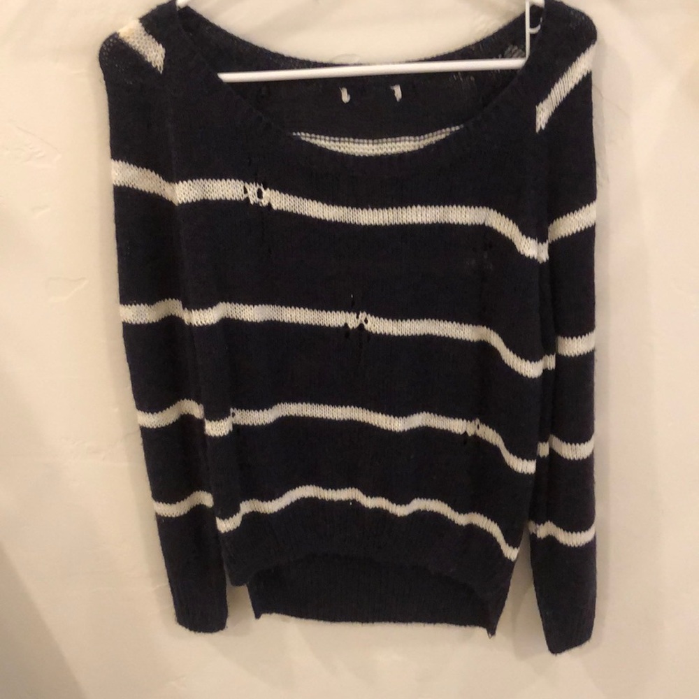 blue and white ripped sweater